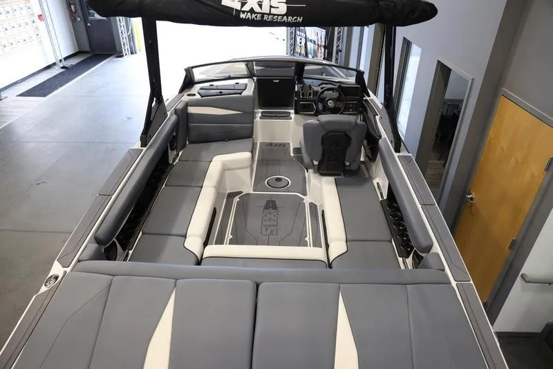 Slide: The Image of 2024 Axis A225 boat interior with spacious seating and modern design. - 18