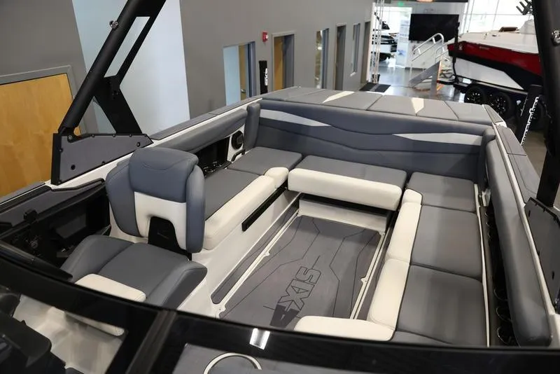 Slide: The Image of 2024 Axis A225 boat interior with gray and white seating, modern design. - 7