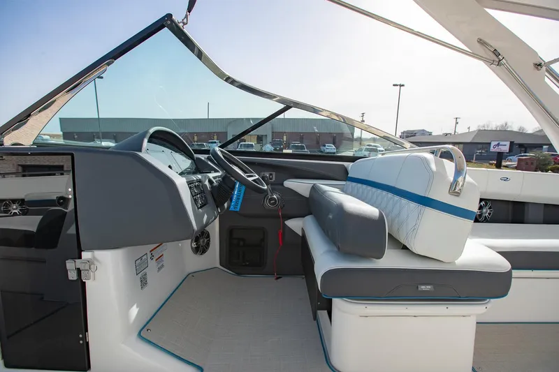 Slide: The Image of 2022 Regal 2800 Bowrider interior with modern dashboard and seating. - 18