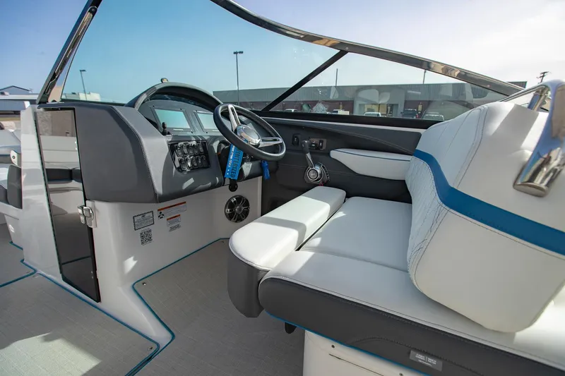 Slide: The Image of 2022 Regal 2800 Bowrider interior with modern dashboard and seating. - 19