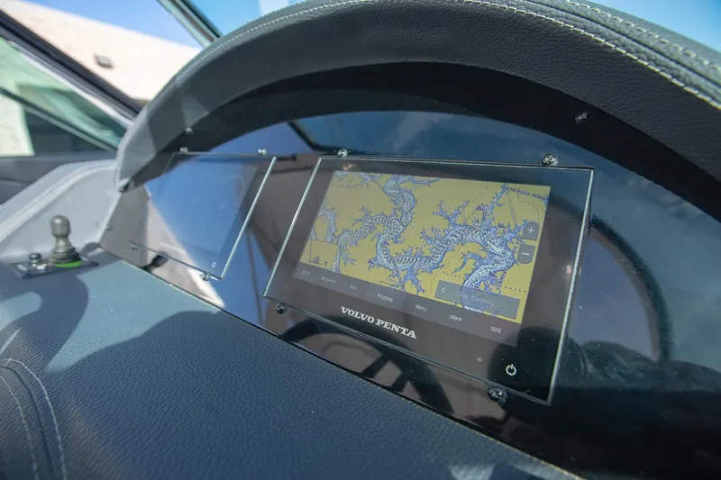 Slide: The Image of Dashboard of 2022 Regal 2800 Bowrider with Volvo Penta navigation display. - 23