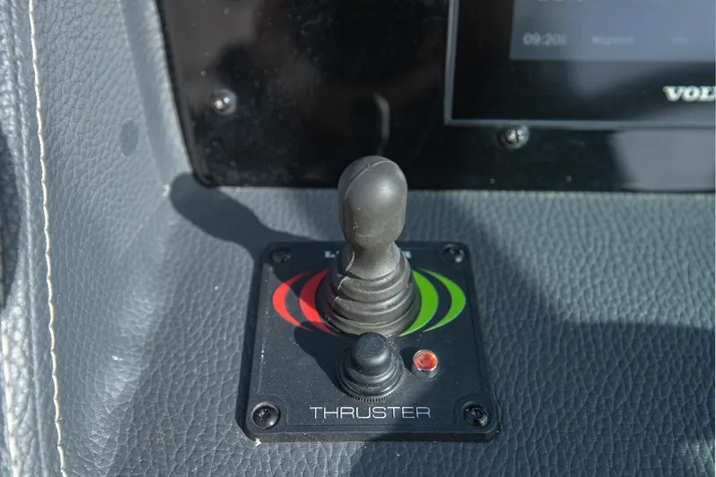 Slide: The Image of Joystick control for thruster on 2022 Regal 2800 Bowrider boat dashboard. - 25