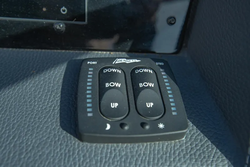 Slide: The Image of Control panel on a 2022 Regal 2800 Bowrider boat dashboard. - 29
