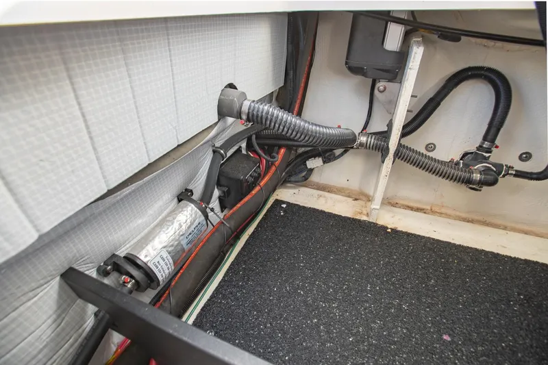 Slide: The Image of Interior view of 2022 Regal 2800 Bowrider boat showing wiring and components. - 40