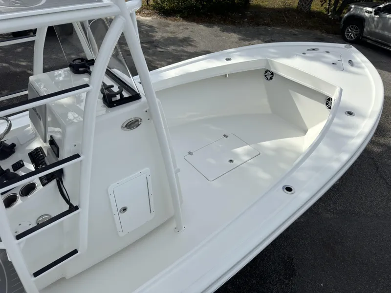 Slide: The Image of 2025 Pair Customs 24DV boat, sleek white deck, spacious layout, modern design. - 2