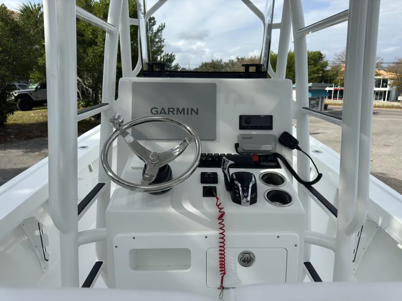 Slide: The Image of 2025 Pair Customs 24DV boat console with Garmin navigation system. - 21