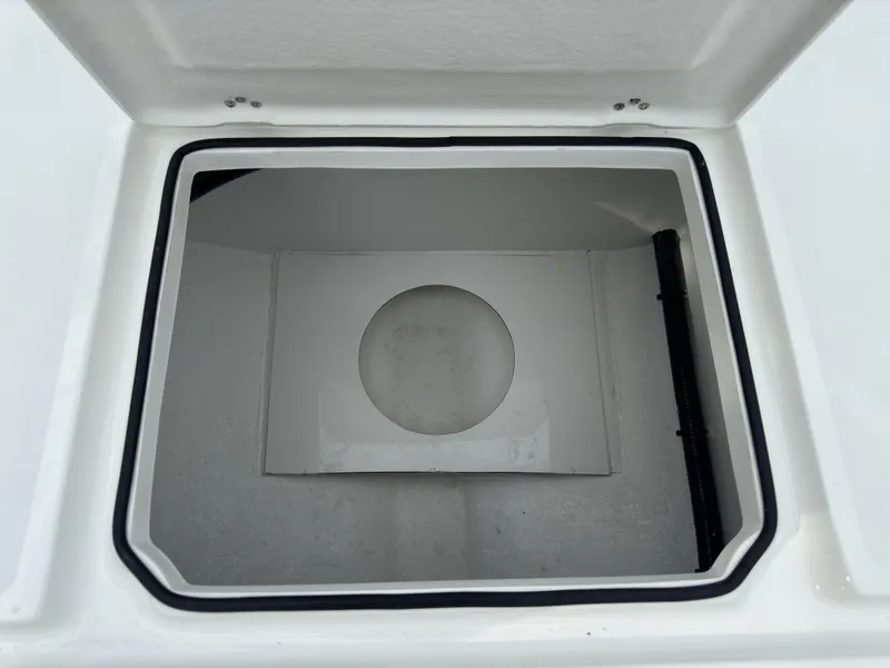 Slide: The Image of Open storage compartment of 2025 Pair Customs 24DV boat. - 4