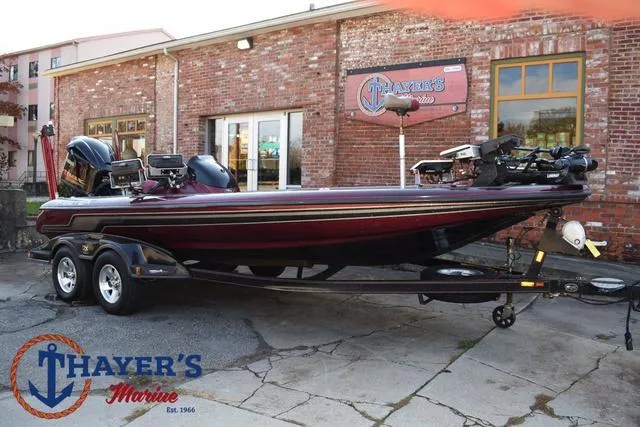 Slide: The Image of 2010 Skeeter ZX225 bass boat on trailer at Thayer's Marine. - 1