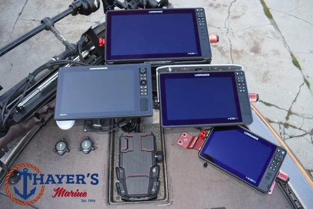 Slide: The Image of Lowrance fish finders on a 2010 Skeeter ZX225 boat at Thayer's Marine. - 10