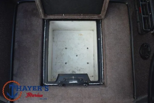 Slide: The Image of Skeeter ZX225 2010 boat storage compartment, Thayer's Marine logo visible. - 18