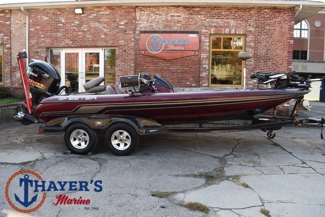 Slide: The Image of 2010 Skeeter ZX225 bass boat at Thayer's Marine dealership. - 2