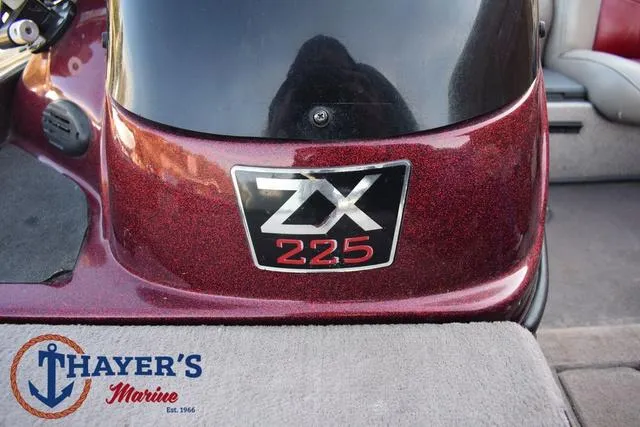 Slide: The Image of 2010 Skeeter ZX225 boat detail with Thayer's Marine logo. - 27