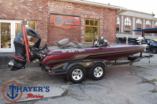 Slide: The Image of 2010 Skeeter ZX225 bass boat at Thayer's Marine dealership. - 3