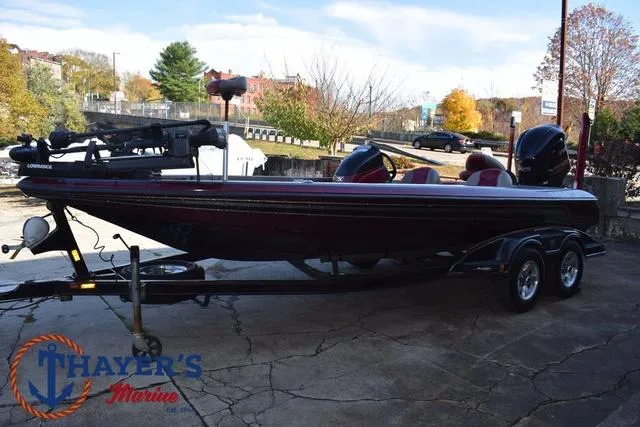 Slide: The Image of 2010 Skeeter ZX225 bass boat on trailer at Thayer's Marine. - 6