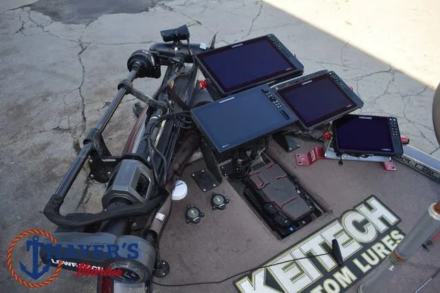 Slide: The Image of 2010 Skeeter ZX225 boat with multiple electronic displays and fishing equipment. - 9