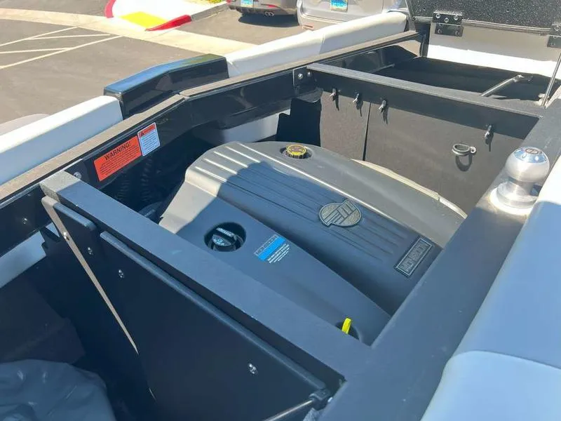 Slide: The Image of 2021 Malibu 22 LSV engine compartment, showcasing sleek design and powerful performance features. - 12