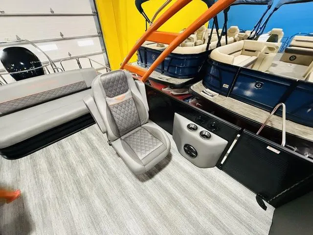 Slide: The Image of 2025 Bennington L Swingback 23 LSBA interior with luxurious seating and modern design. - 13