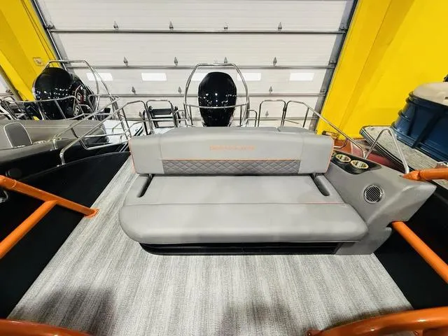 Slide: The Image of 2025 Bennington L Swingback 23 LSBA boat interior with gray seating and modern design. - 16