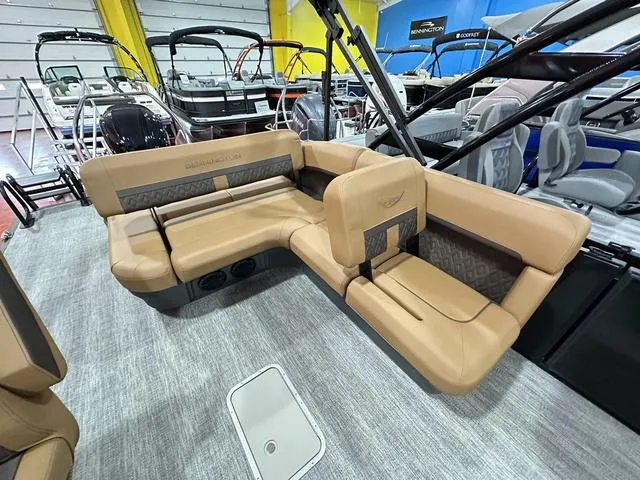 Slide: The Image of 2025 Bennington M Swingback 24 MSB pontoon boat with Yamaha 350 engine in showroom. - 20