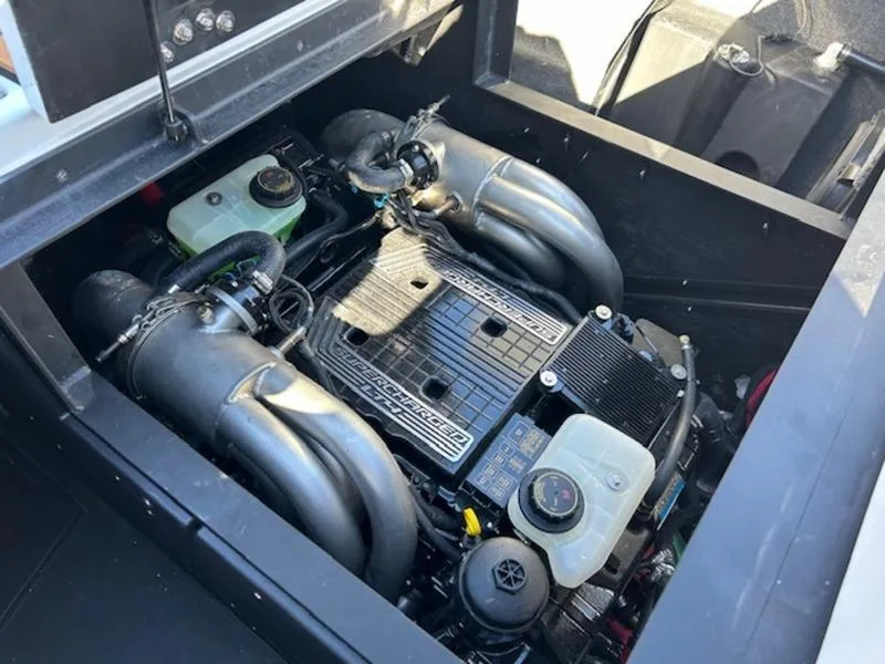 Slide: The Image of 2025 Malibu M242 engine compartment showcasing powerful marine engine components. - 3