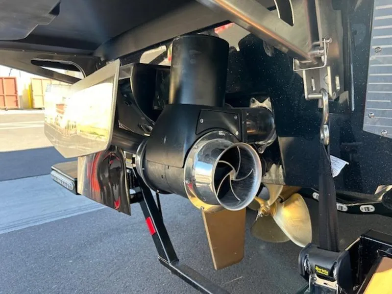 Slide: The Image of Close-up of 2025 Malibu M242 boat propeller and exhaust system. - 33