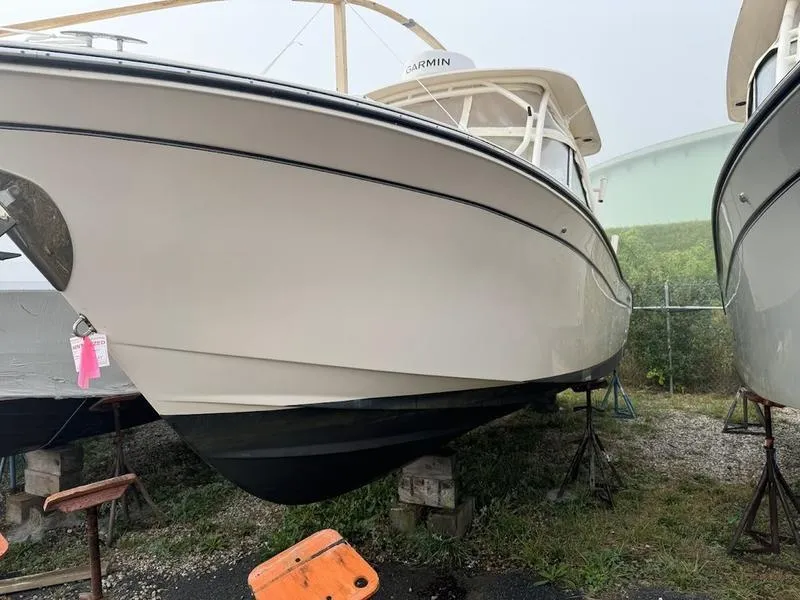 Slide: The Image of 2022 Grady-White 275 Freedom boat on stands, side view. - 3