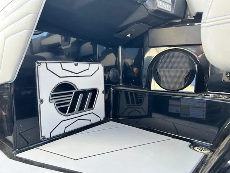 Slide: The Image of 2025 Malibu 25 LSV interior with sleek audio system and modern design. - 15