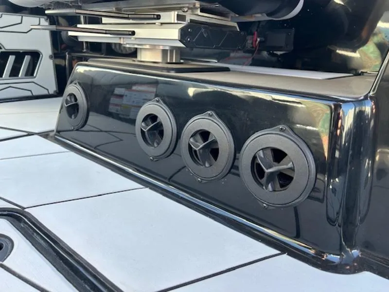 Slide: The Image of Close-up of 2025 Malibu 25 LSV boat's sleek black speaker system. - 16