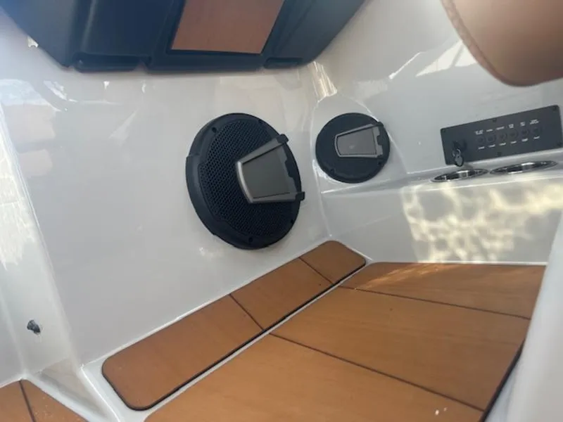 Slide: The Image of Interior of 2025 Axis A225 boat with speakers and control panel. - 16