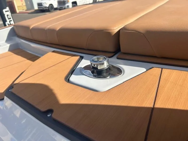 Slide: The Image of Axis A225 2025 boat deck with tan upholstery and sleek design. - 23