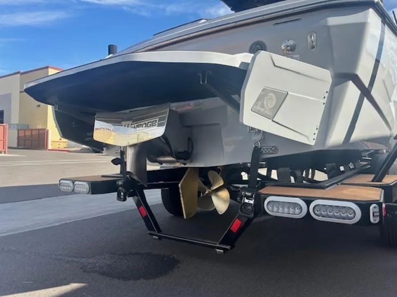 Slide: The Image of Axis A225 2025 boat rear view with propeller and trailer. - 5