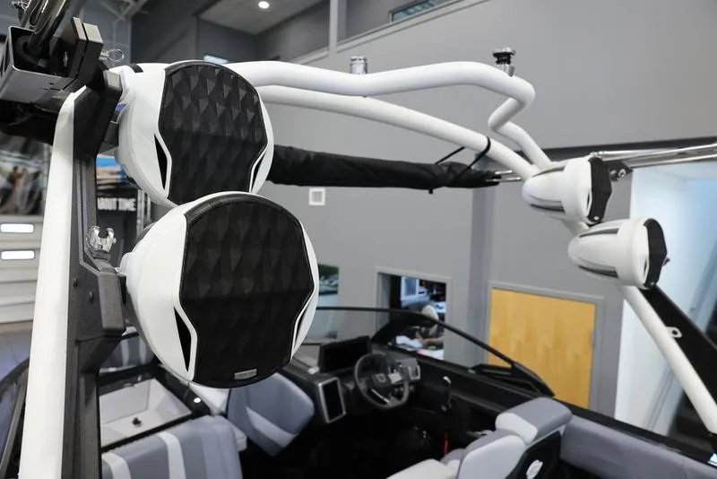 Slide: The Image of 2024 Malibu 22 LSV boat interior with advanced speaker system and sleek design. - 10