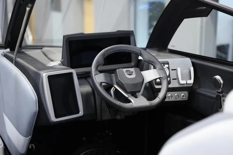 Slide: The Image of 2024 Malibu 22 LSV interior dashboard with modern steering wheel and digital displays. - 12