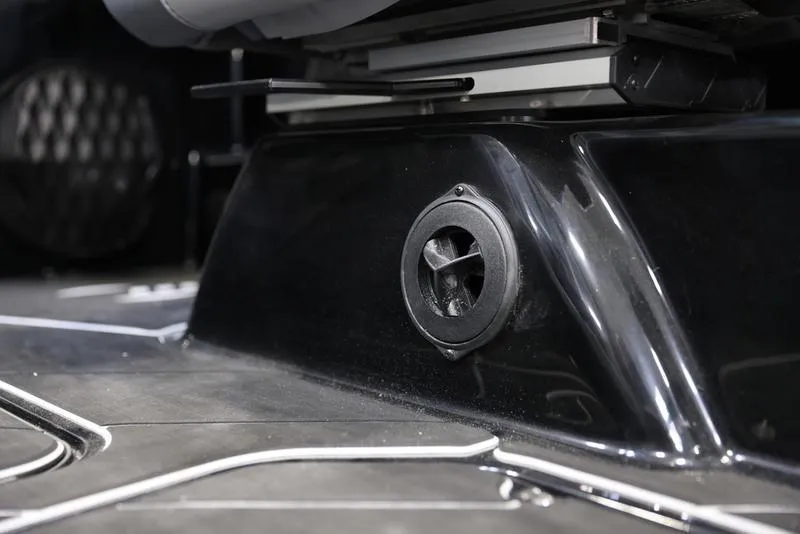 Slide: The Image of 2024 Malibu 22 LSV interior detail, featuring sleek black design and speaker system. - 15