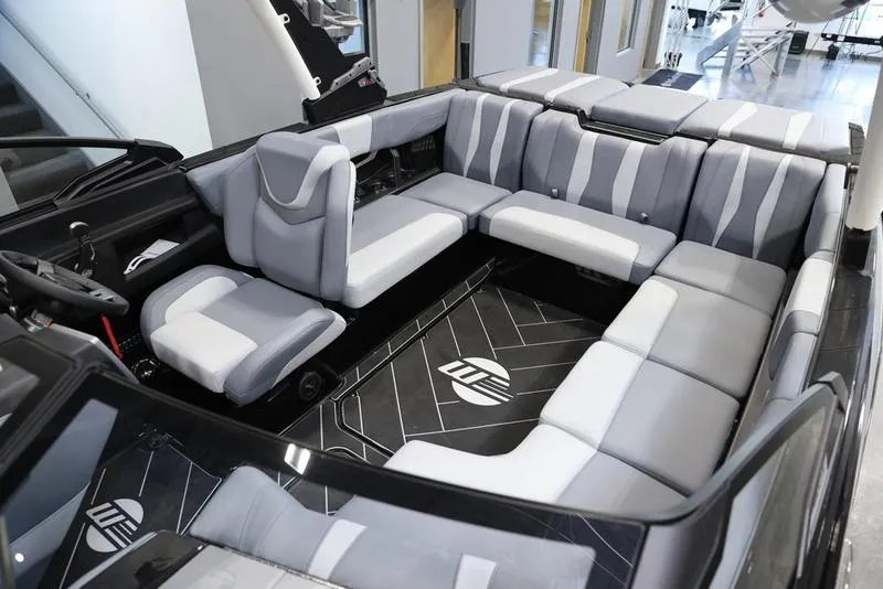 Slide: The Image of 2024 Malibu 22 LSV interior with sleek gray seating and modern design. - 19