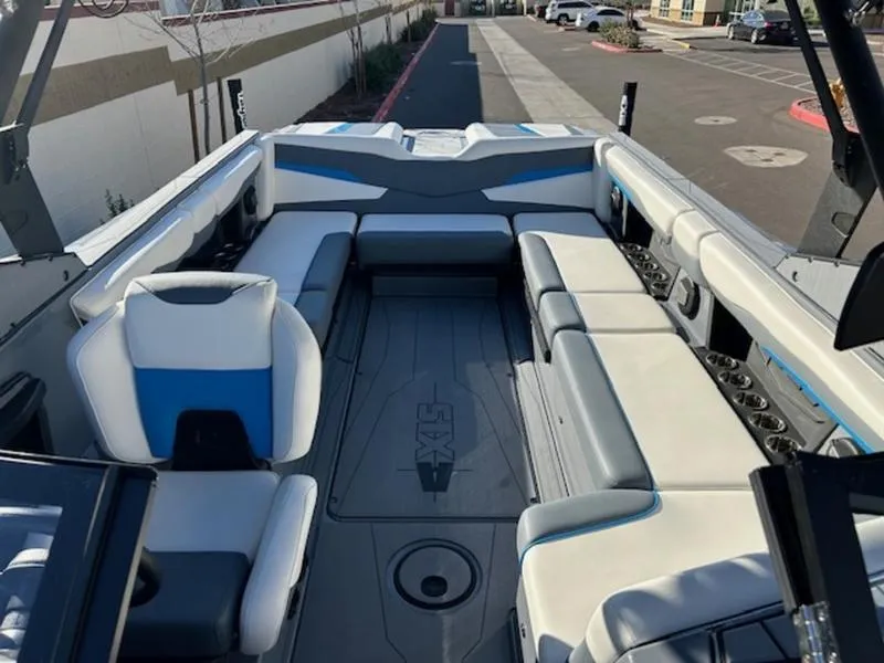 Slide: The Image of 2024 Axis T250 boat interior with spacious seating and modern design. - 13