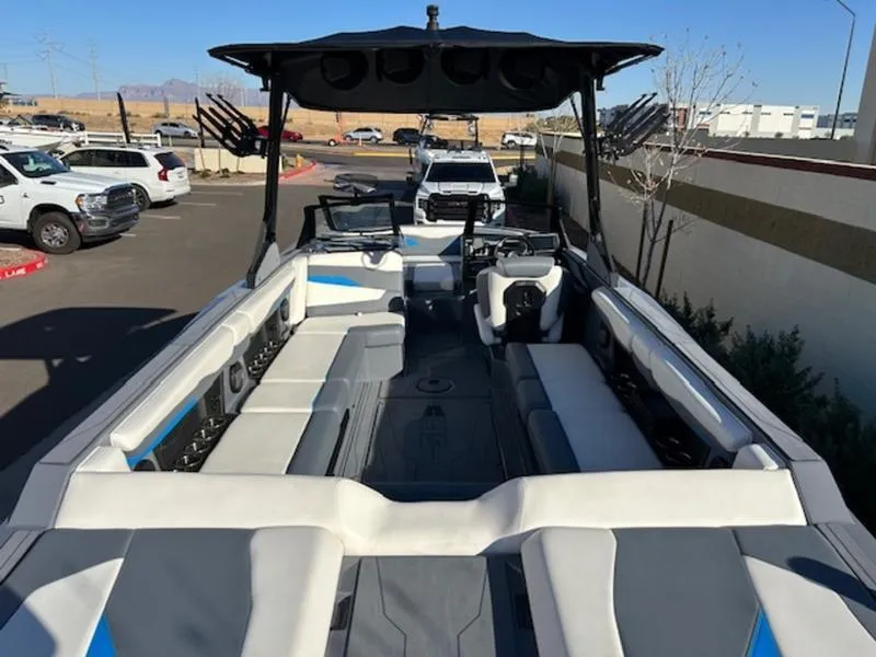 Slide: The Image of 2024 Axis T250 boat interior with spacious seating and modern design. - 7