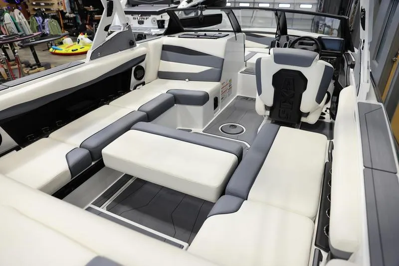 Slide: The Image of 2024 Axis A225 boat interior with modern seating and sleek design. - 16