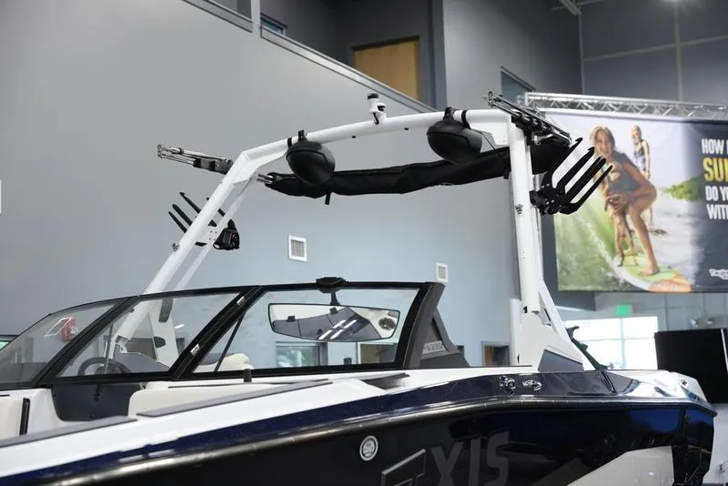 Slide: The Image of 2024 Axis A225 boat with wakeboard tower in showroom. - 4