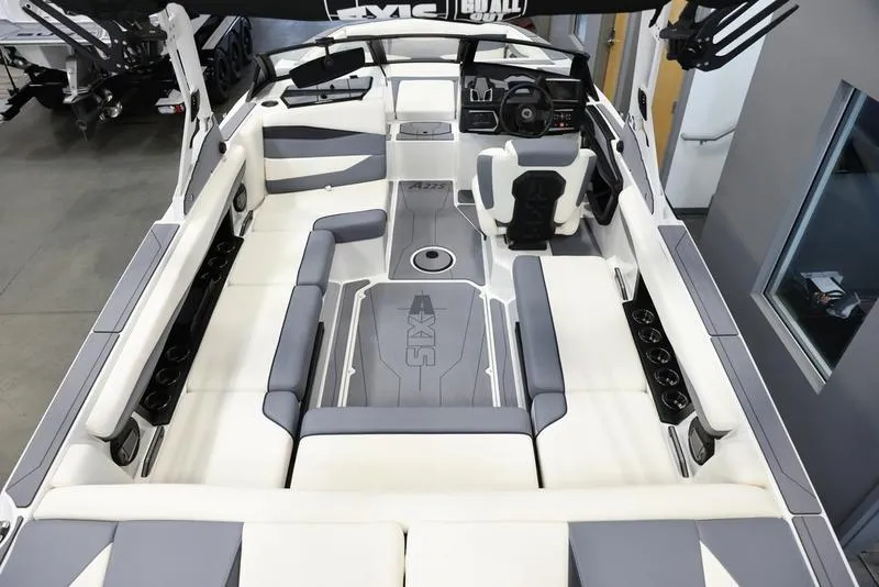 Slide: The Image of 2024 Axis A225 boat interior with modern seating and sleek design. - 6