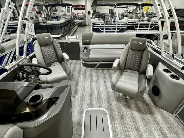Slide: The Image of 2025 Bennington 22 SSB pontoon boat interior with modern seating and sleek design. - 13