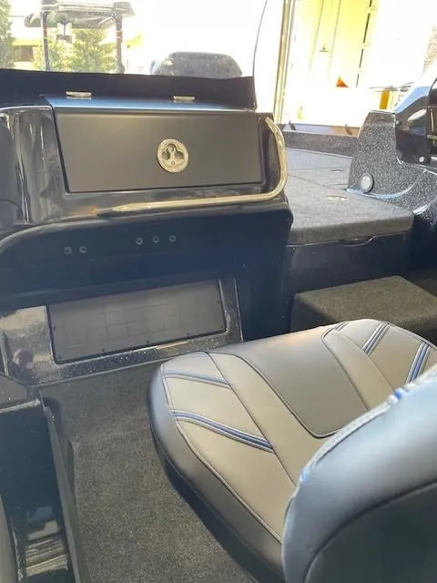 Slide: The Image of Interior of a 2025 Nitro ZV19 boat with sleek seating and dashboard. - 3