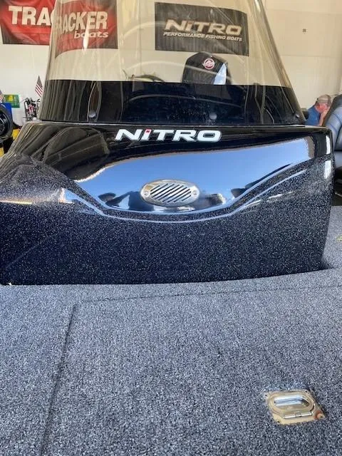Slide: The Image of 2025 Nitro ZV19 boat interior with sleek black design and logo. - 5