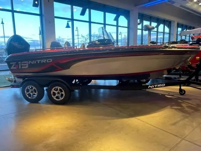 The Image of 2025 Nitro ZV19 boat displayed indoors on a trailer. - 0