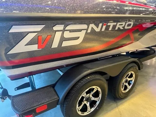 Slide: The Image of 2025 Nitro ZV19 boat on trailer with bold graphics. - 2