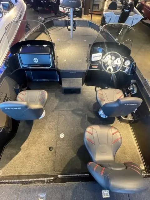 Slide: The Image of 2025 Nitro ZV19 boat interior with four seats and modern dashboard. - 9