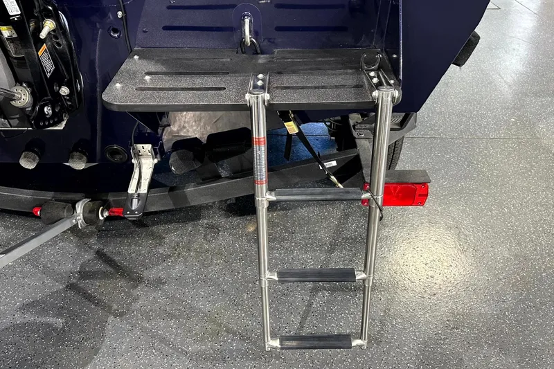 Slide: The Image of 2025 Tracker Targa V-19 WT boat ladder and platform on display. - 11