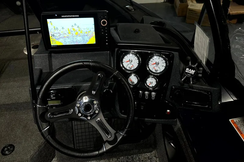 Slide: The Image of 2025 Tracker Targa V-19 WT dashboard with steering wheel and electronic display. - 15