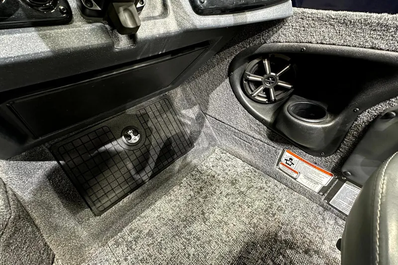 Slide: The Image of Interior of 2025 Tracker Targa V-19 WT boat with speaker and storage compartment. - 23