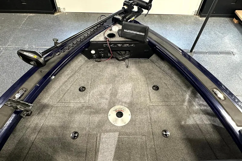 Slide: The Image of 2025 Tracker Targa V-19 WT boat interior with Humminbird electronics and Minn Kota trolling motor. - 24